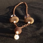 Collana bronzo sfere metallo 1