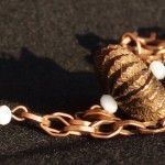 Collana bronzo sfere metallo 3