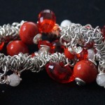 Braccialetto ciondoli rosso 4